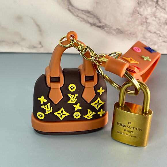 Louis Vuitton Lock #325 with a Mini Fashion Handbag and Loop Keychain - Picture 2 of 4